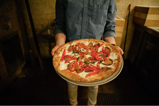 Illustration for article titled It’s National Pizza Day: What’s the all-time best pizza spot in America?